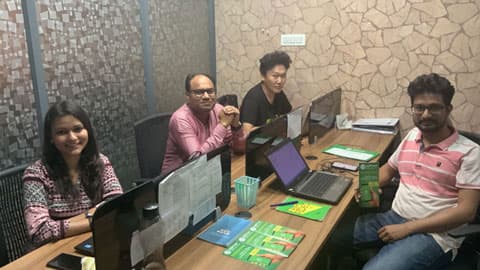 A team working together inside a private cabin